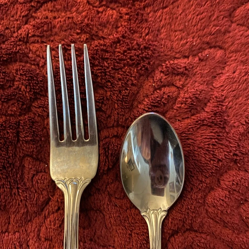 Elegant Silver Fork and Spoon Set. International 18/10. Excellent condition.